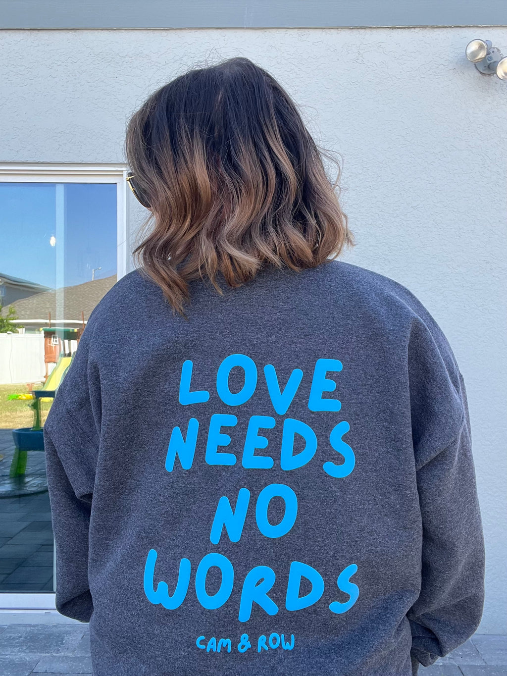 Unisex "Love Needs No Words" Puff Print Sweatshirt