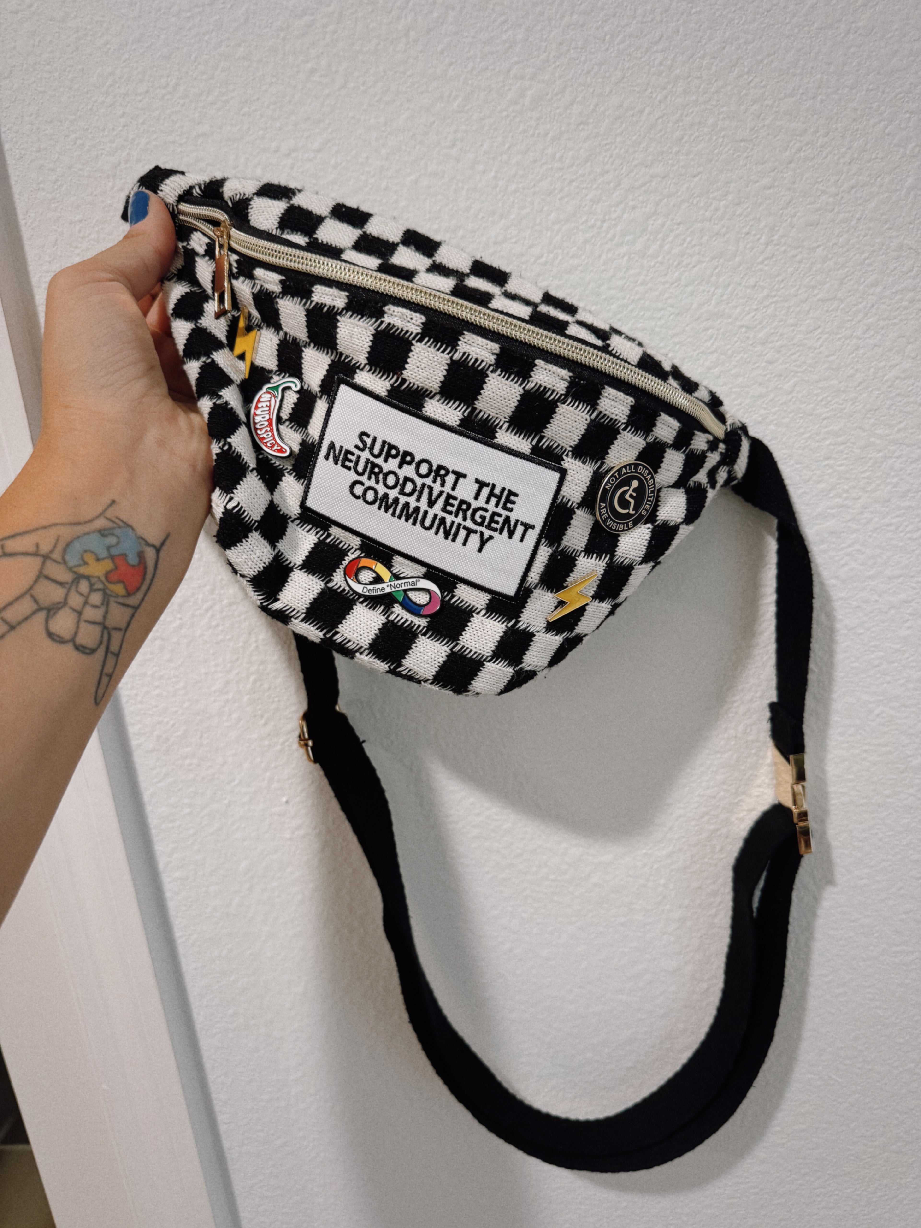 “Support The Neurodivergent Community” Patch Checkered Sling Bag
