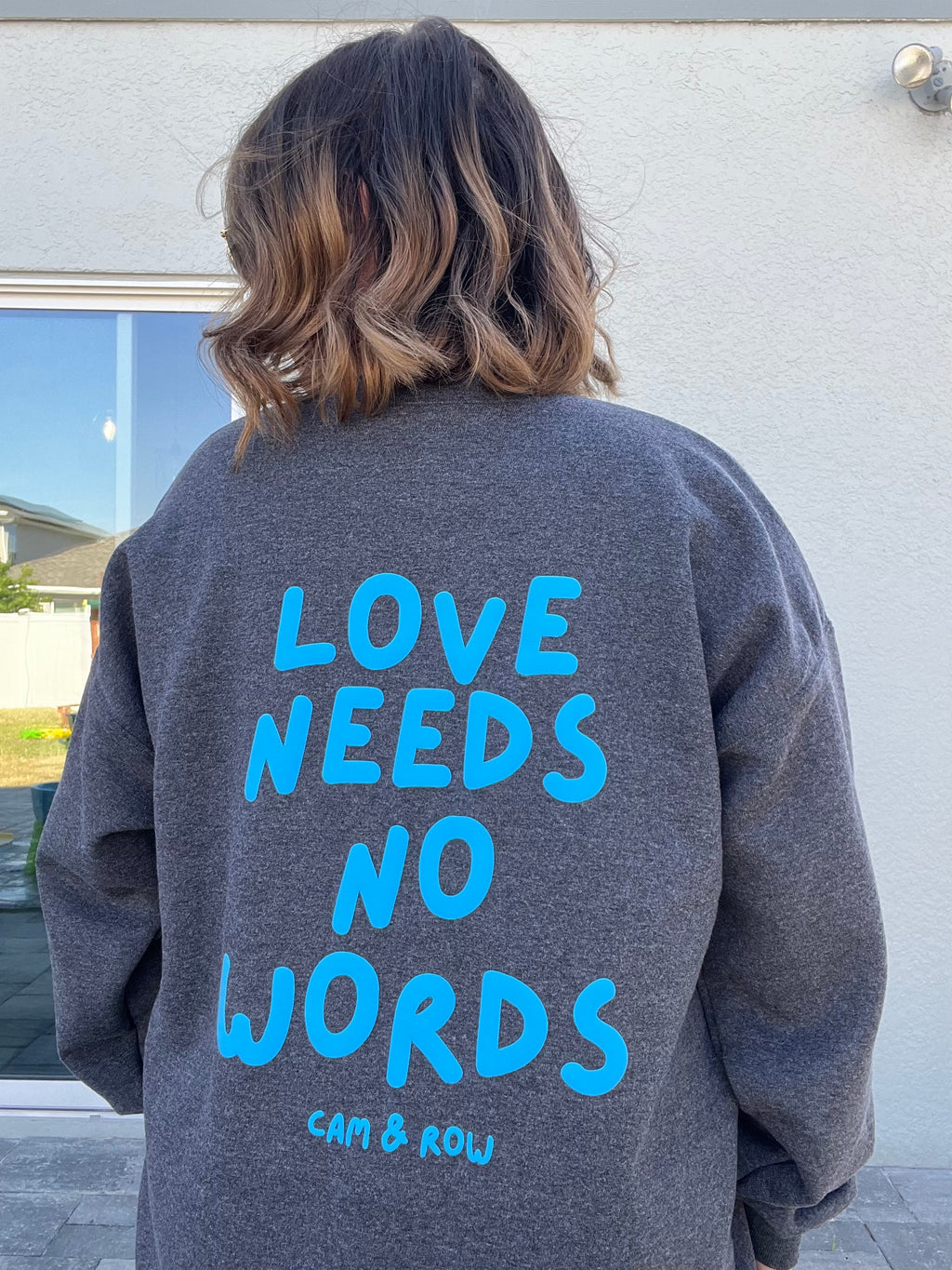 Unisex "Love Needs No Words" Puff Print Sweatshirt