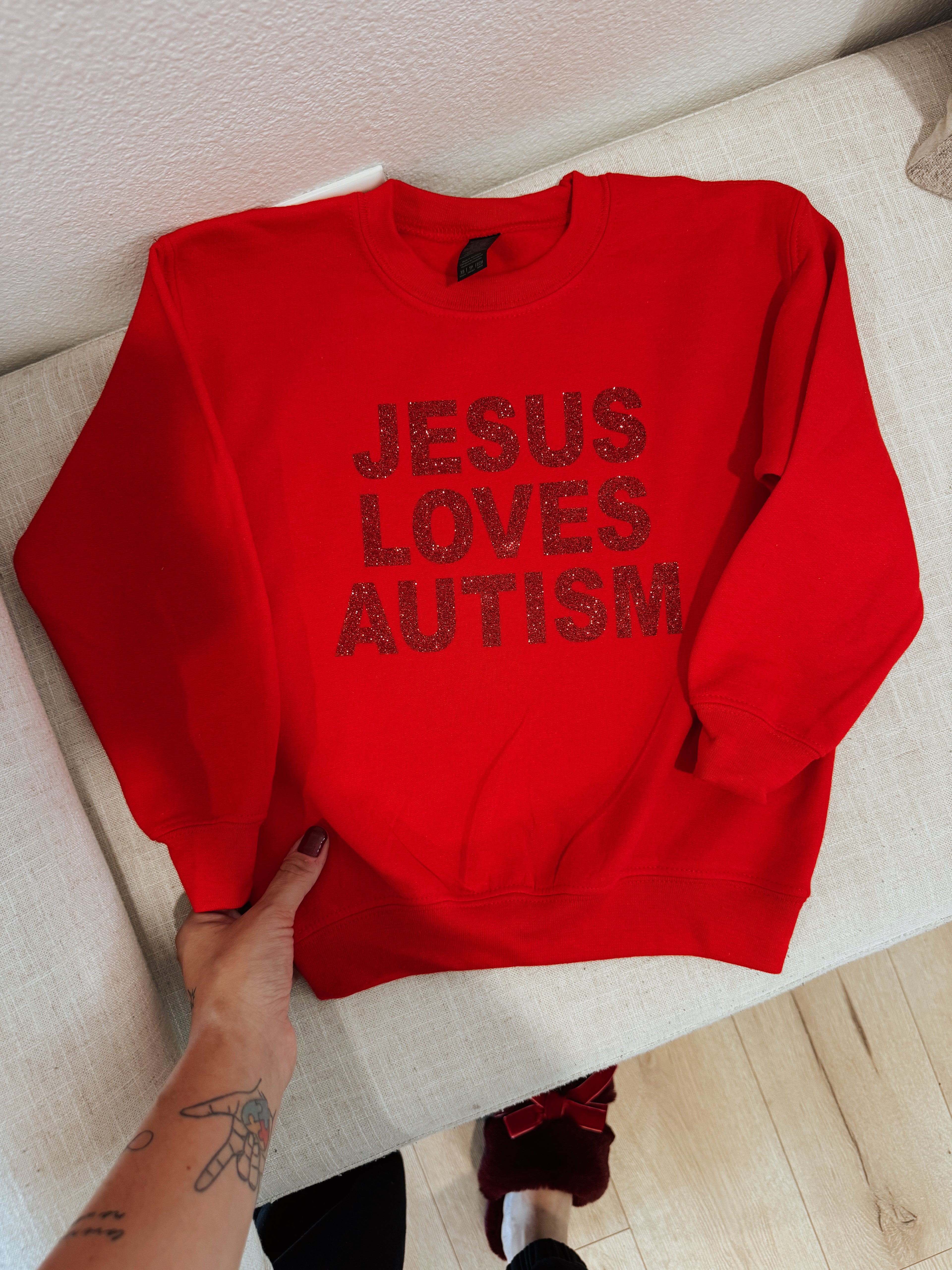 Toddler + Youth “Jesus Loves Autism” Christmas Red Sparkle Crewneck