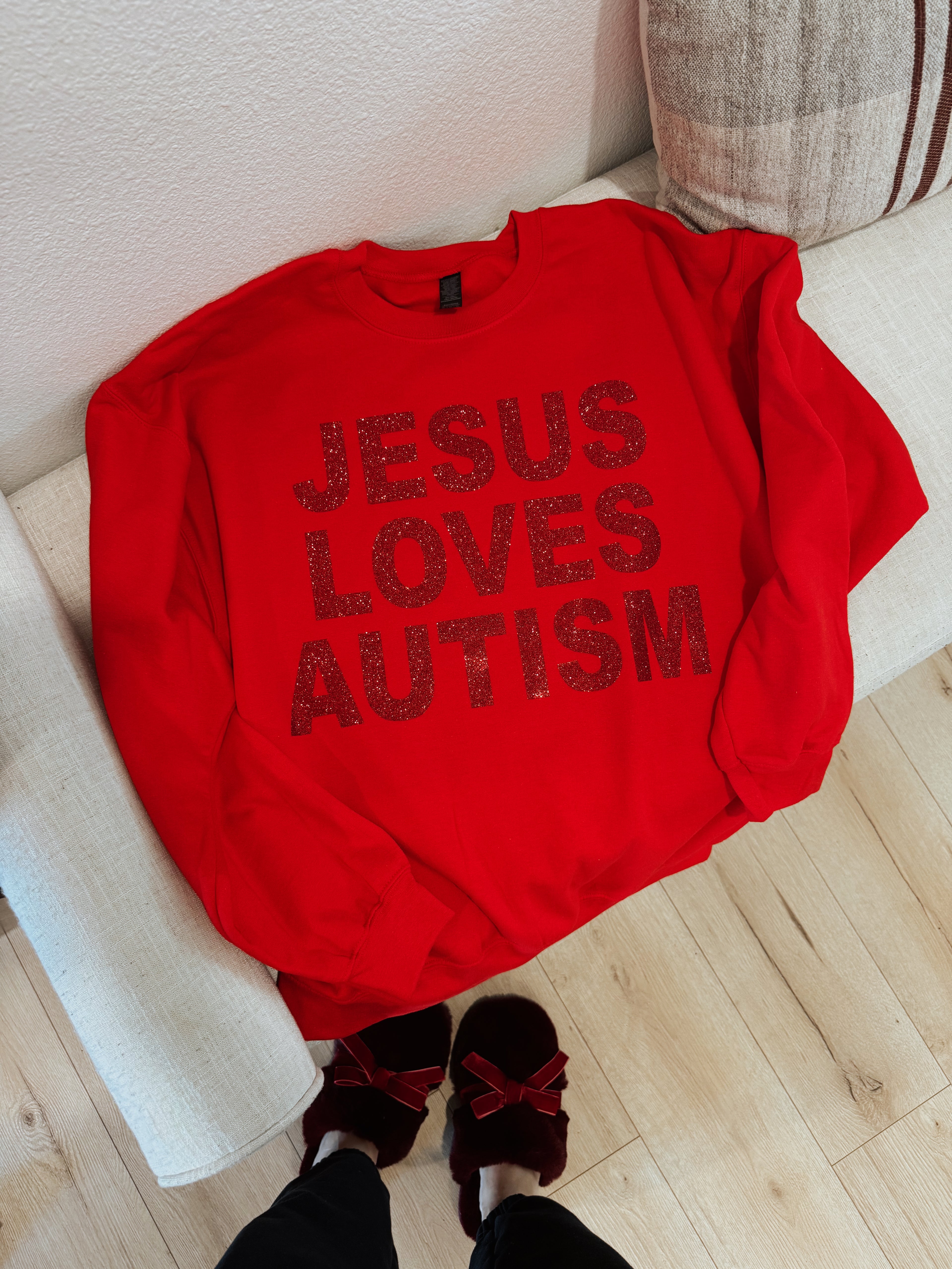 Unisex “Jesus Loves Autism” Christmas Red Sparkle Crewneck