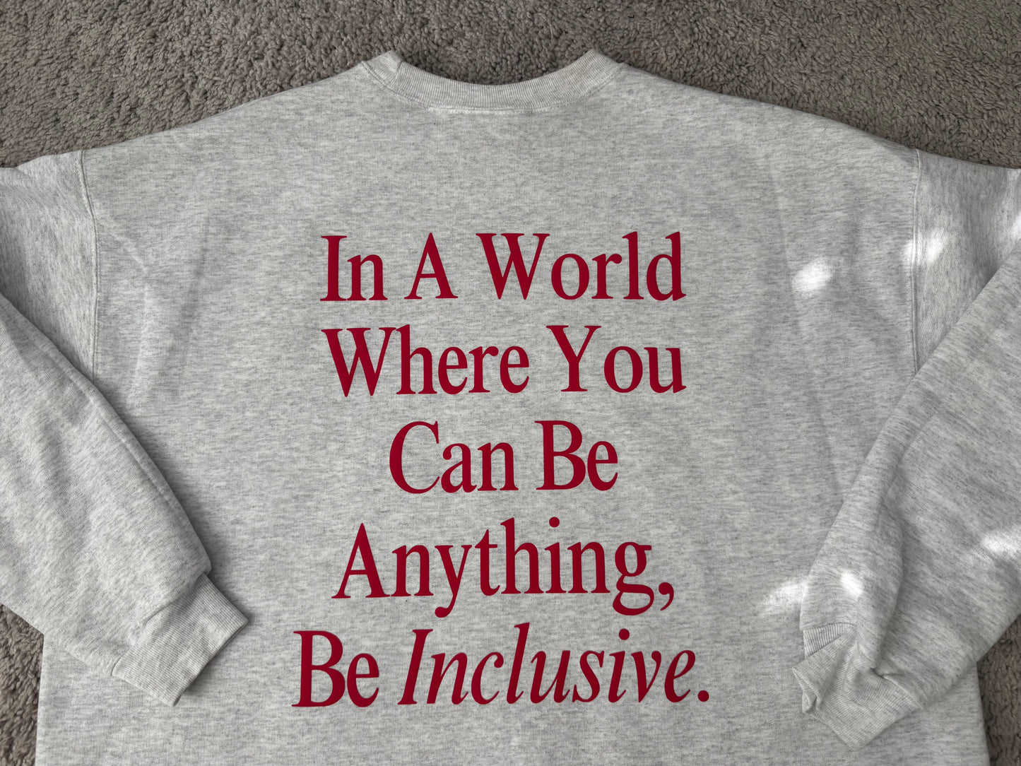 Unisex Be Inclusive Puff Print Sweatshirt