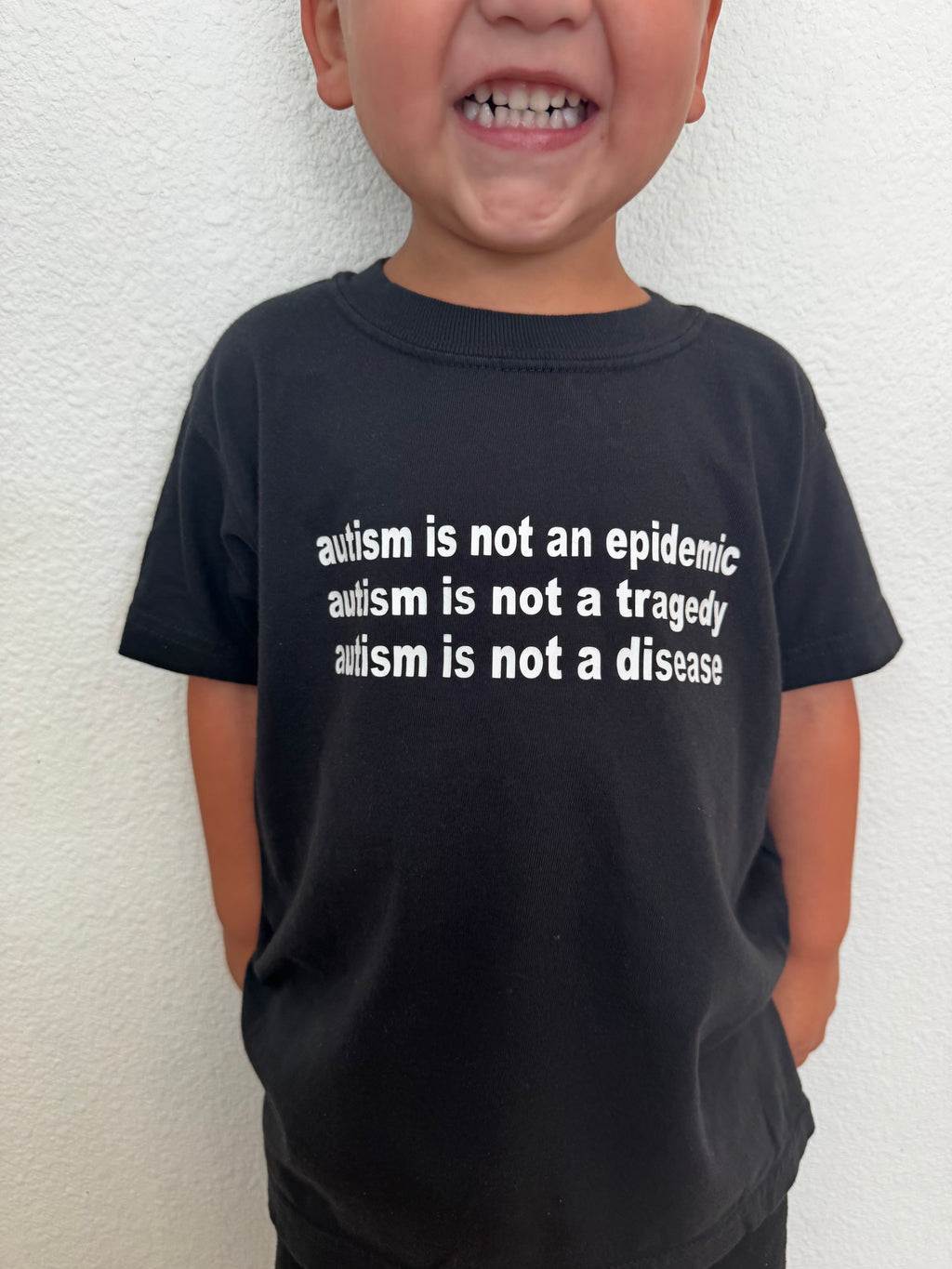 Toddler + Youth “Autism is not an epidemic, a tragedy, or disease” T-Shirt