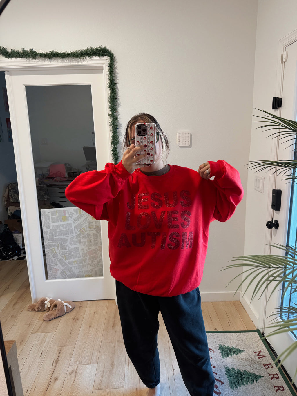 Unisex “Jesus Loves Autism” Christmas Red Sparkle Crewneck