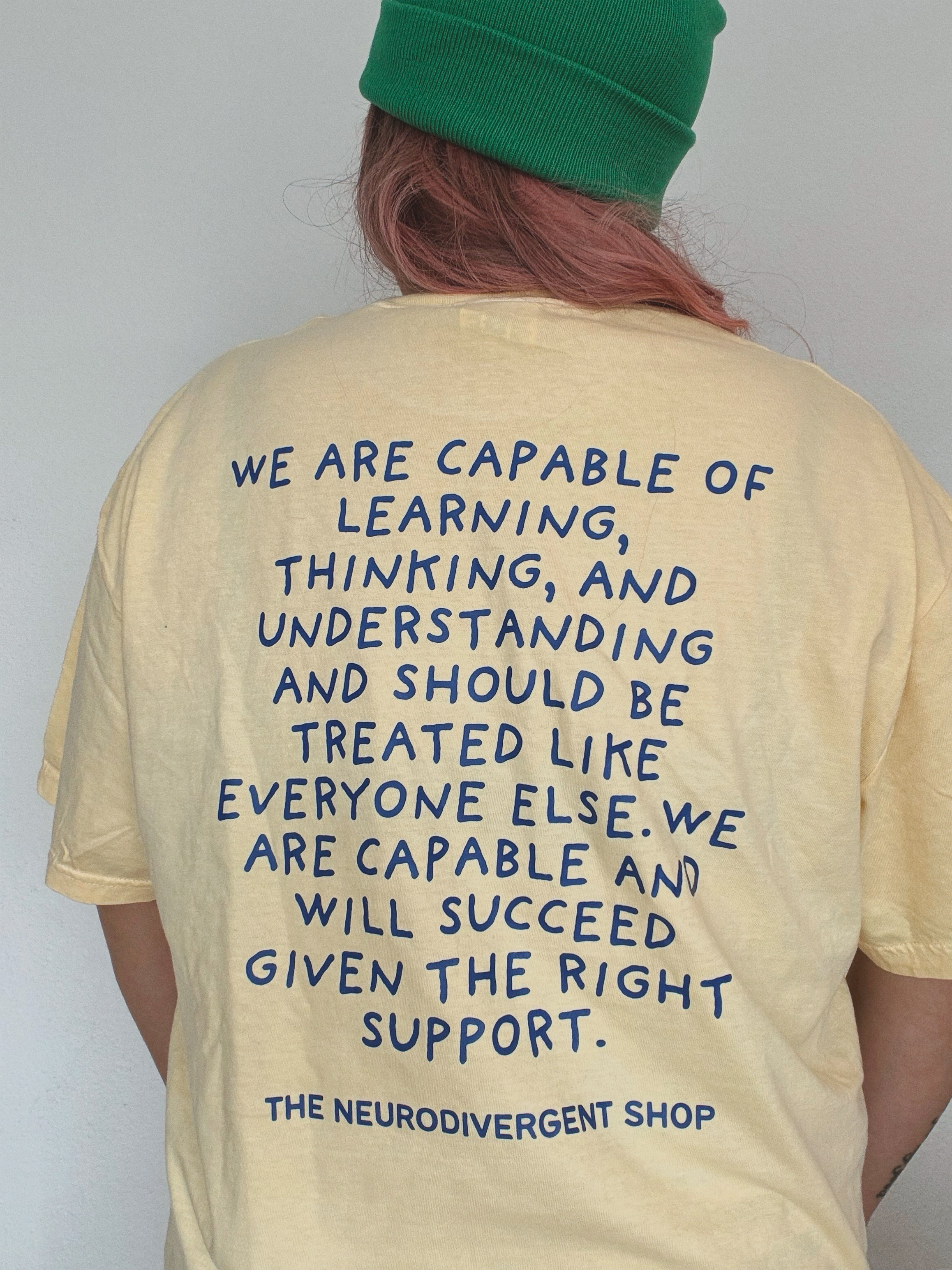 Unisex “Presume Competence" T-Shirt