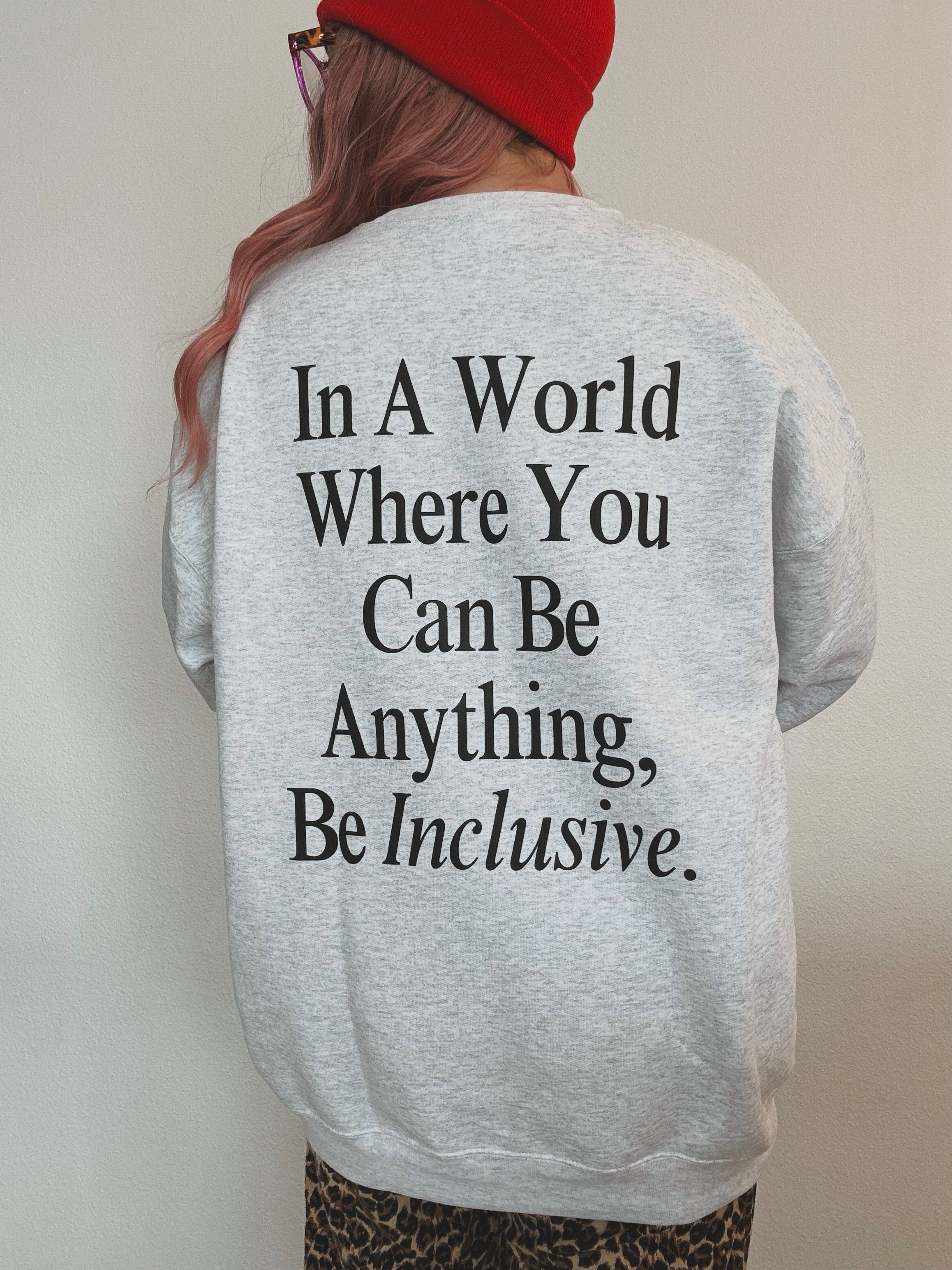 Unisex "Be Inclusive" Puff Print Sweatshirt