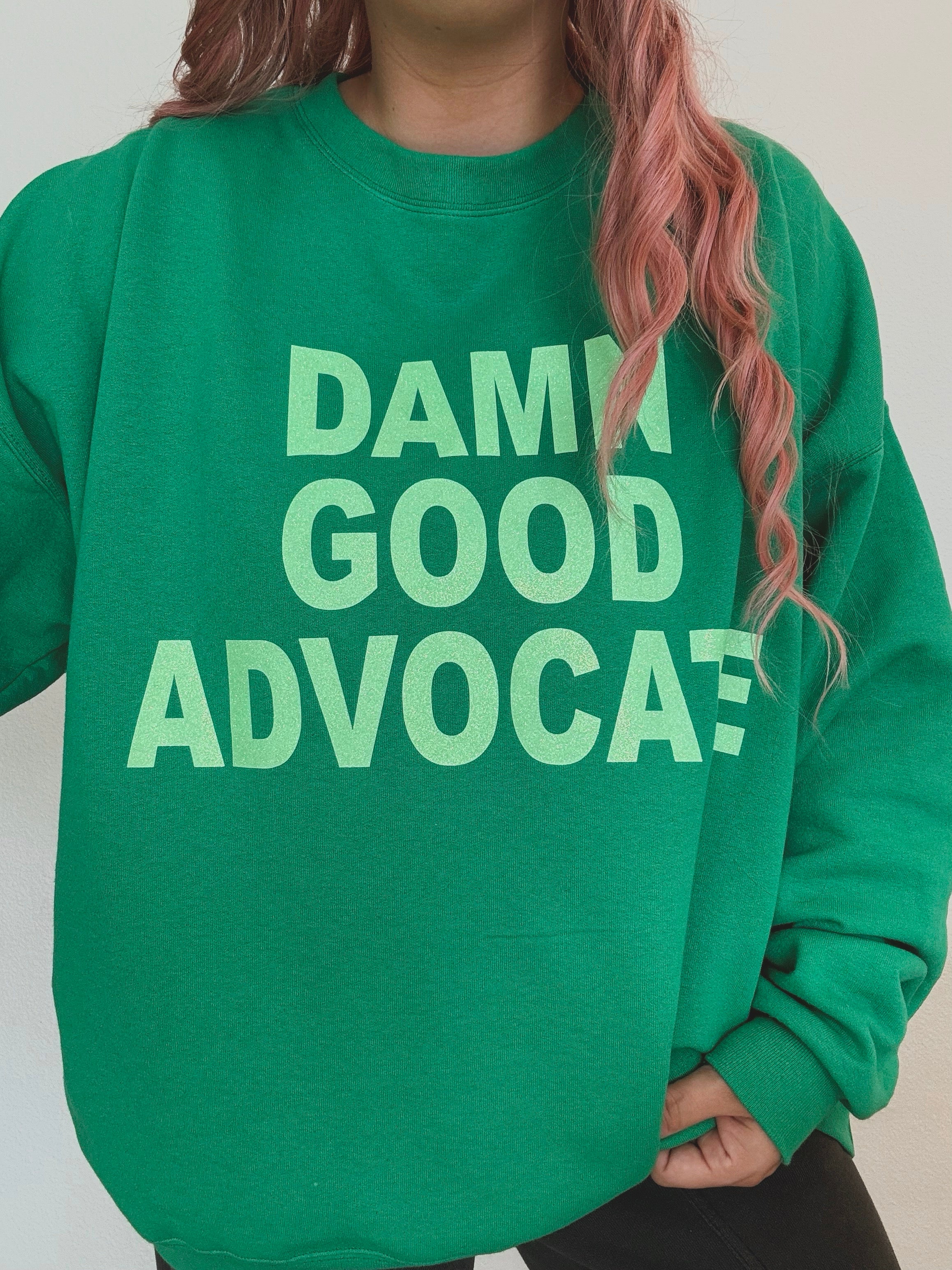Unisex Kelly Green "Damn Good Advocate" Glitter Print Sweatshirt