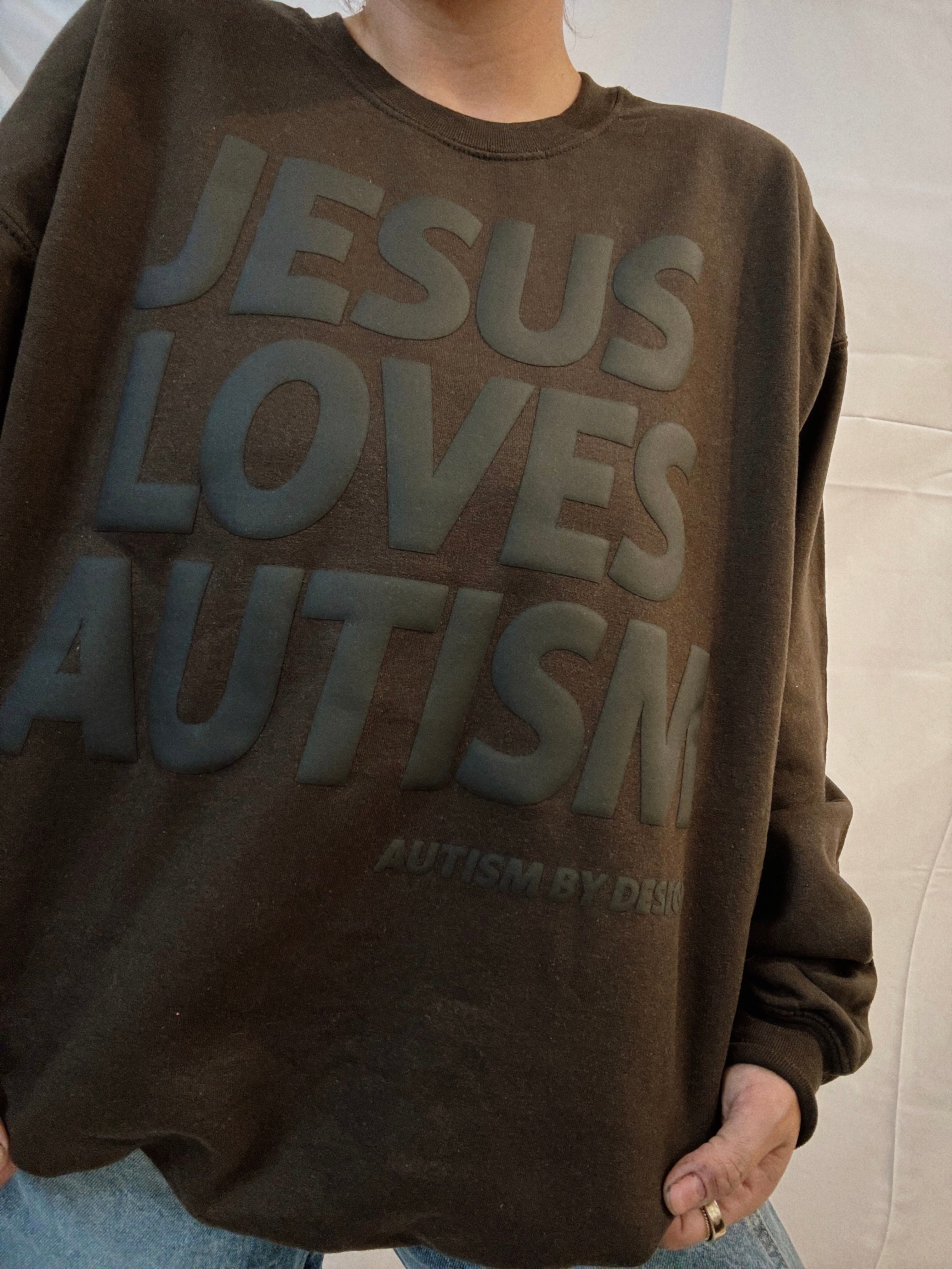 Unisex Chocolate "Jesus Loves Autism" Puff Print Sweatshirt