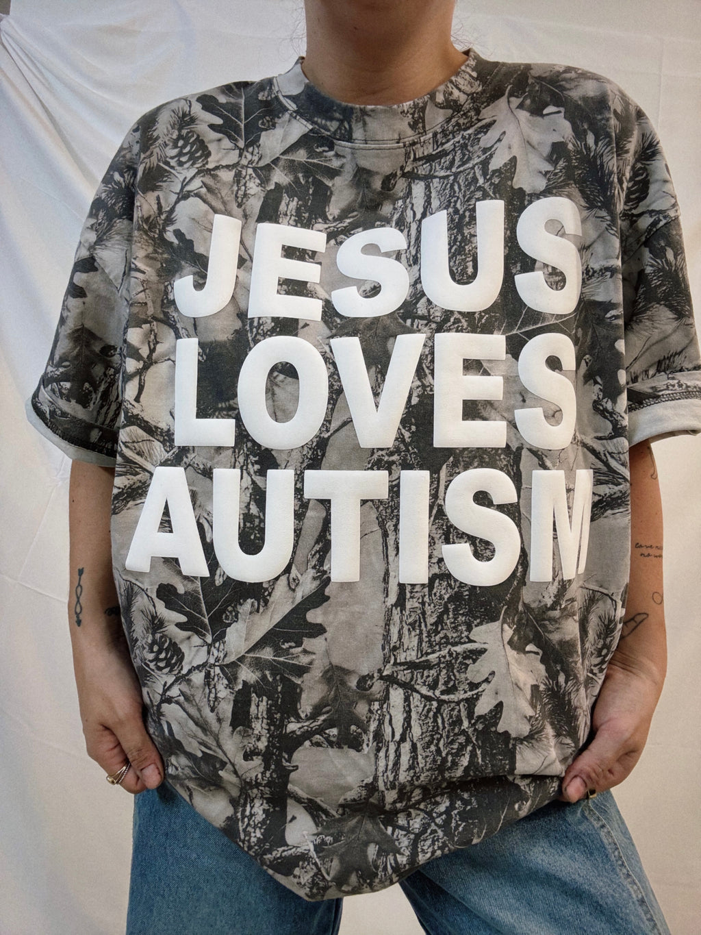 Snow Camo "Jesus Loves Autism" Cotton Collective T-Shirt