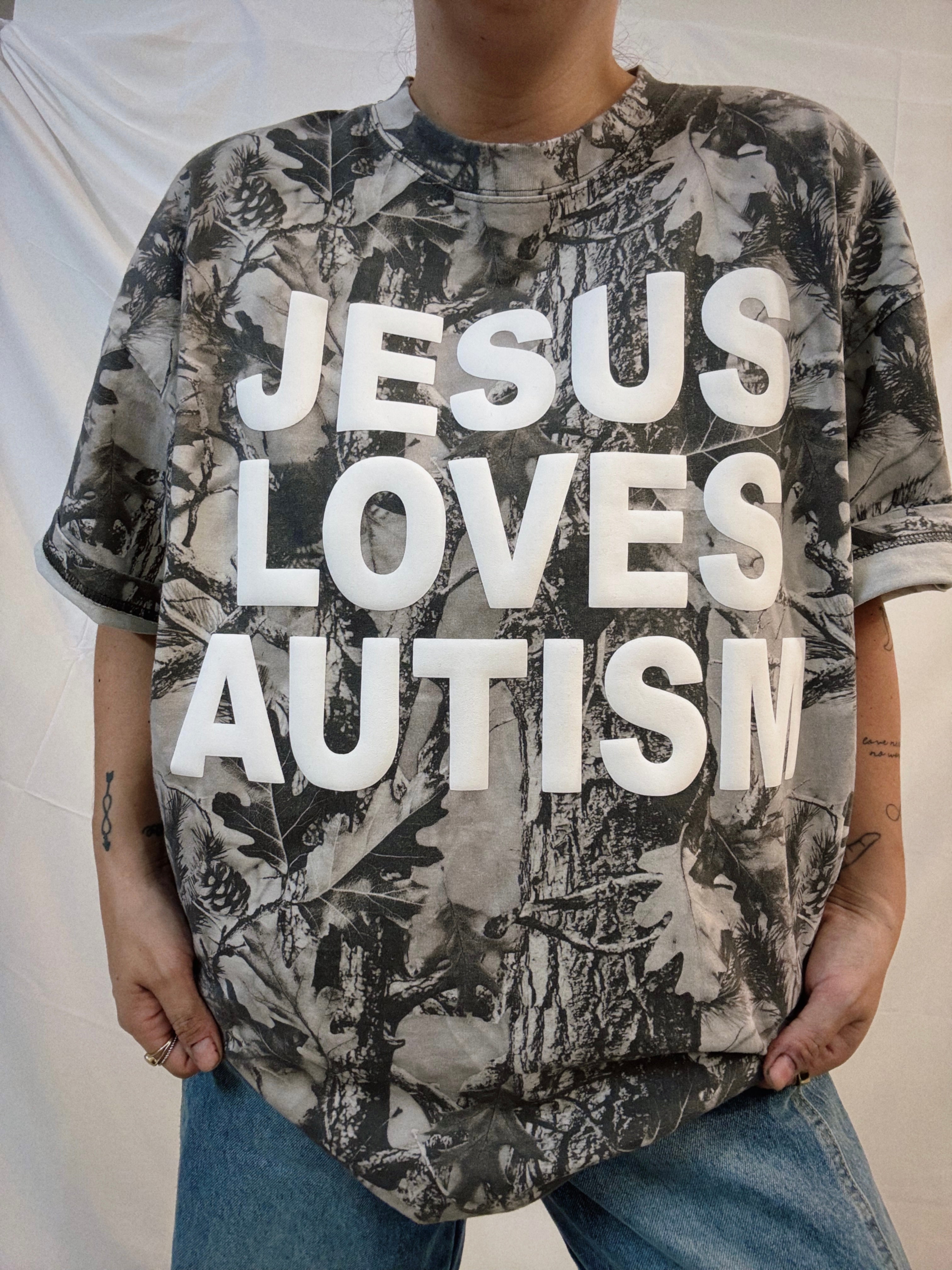 Snow Camo "Jesus Loves Autism" Cotton Collective T-Shirt